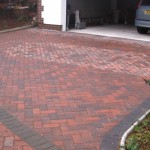 New double garage paved driveway